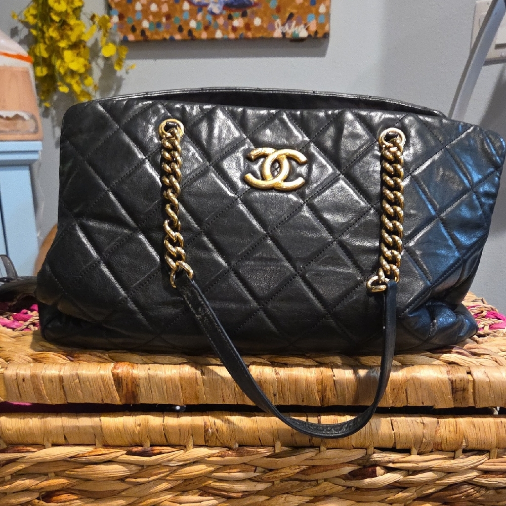 CHANEL Black Quilted Shoulder Bag with Gold Accents